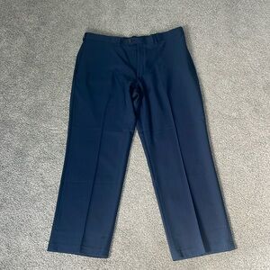 5 pairs of men’s Haggar classic fit navy dress pants.
Very good condition